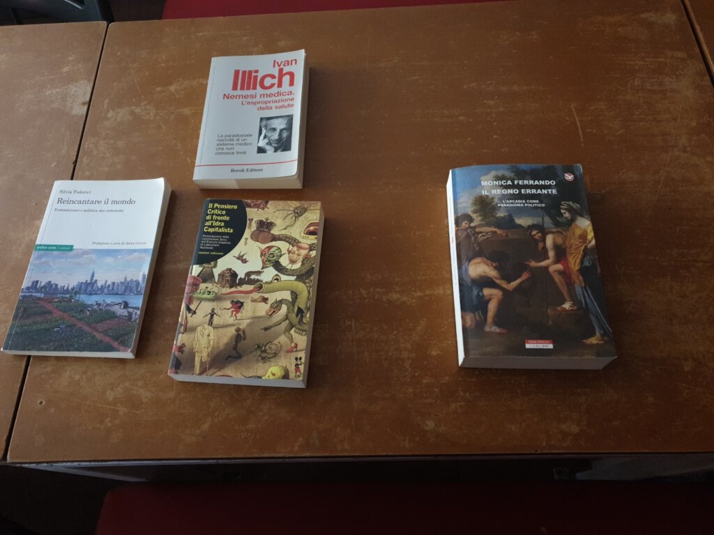 Photos of different books lying on a table